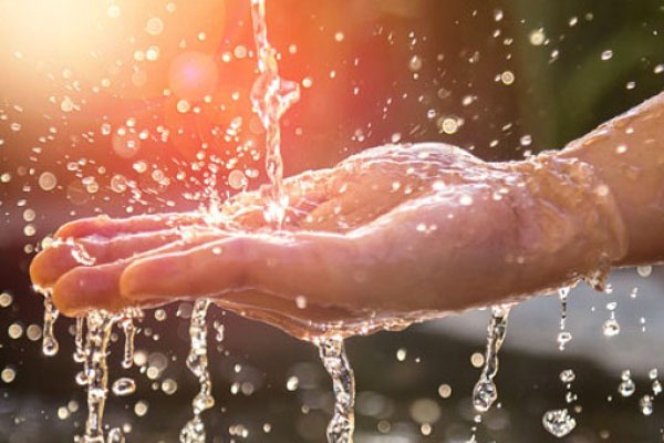 Hands washing in water